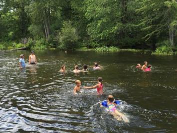 Swimming in the river during Preston Rosedale Summer Camp